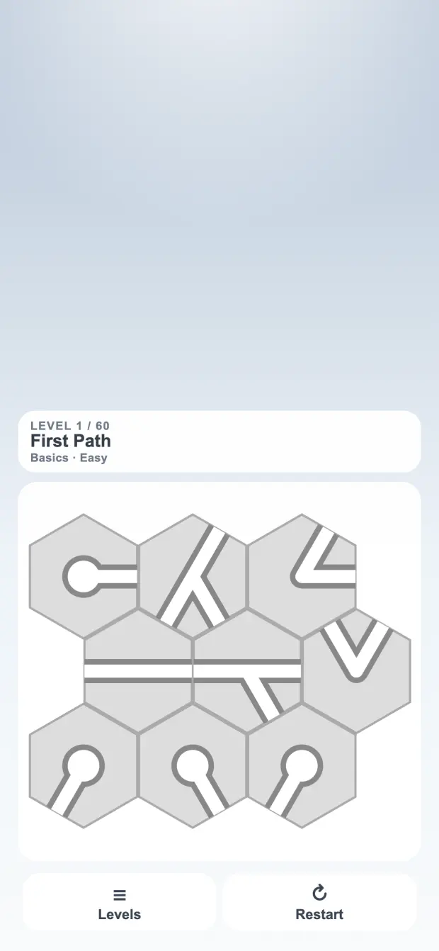 Path Puzzle product interface. Rotating pieces is taught inside the first playable board.